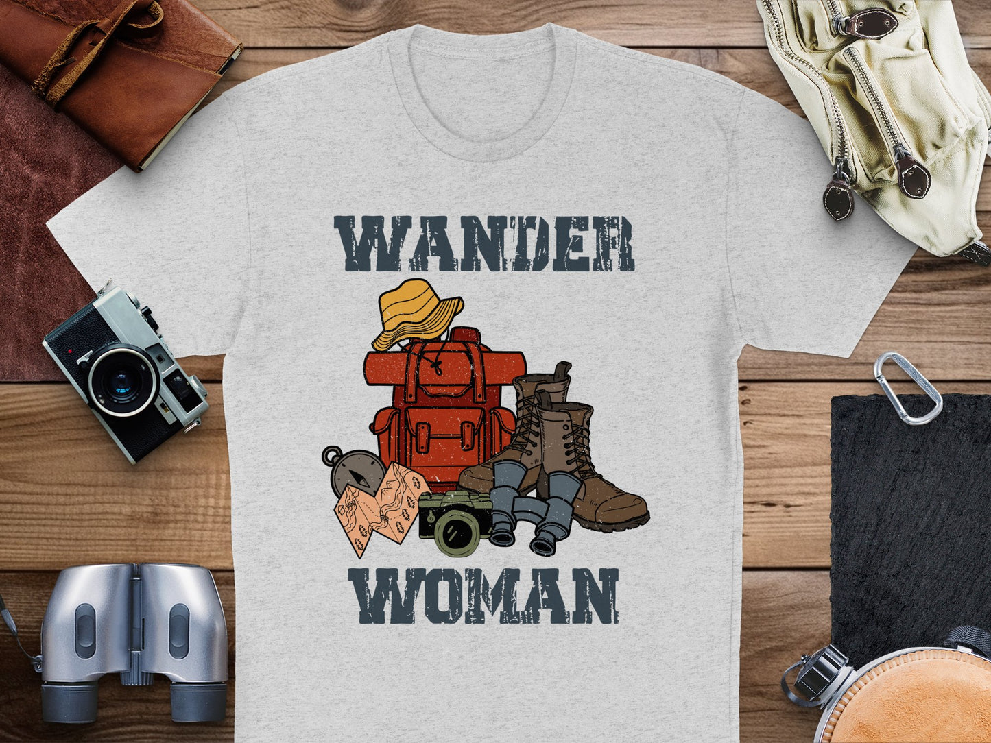 Wander Woman T-Shirt Travel-Themed Graphic Tee Adventure Clothing Hiking Boots Backpack Camera Design