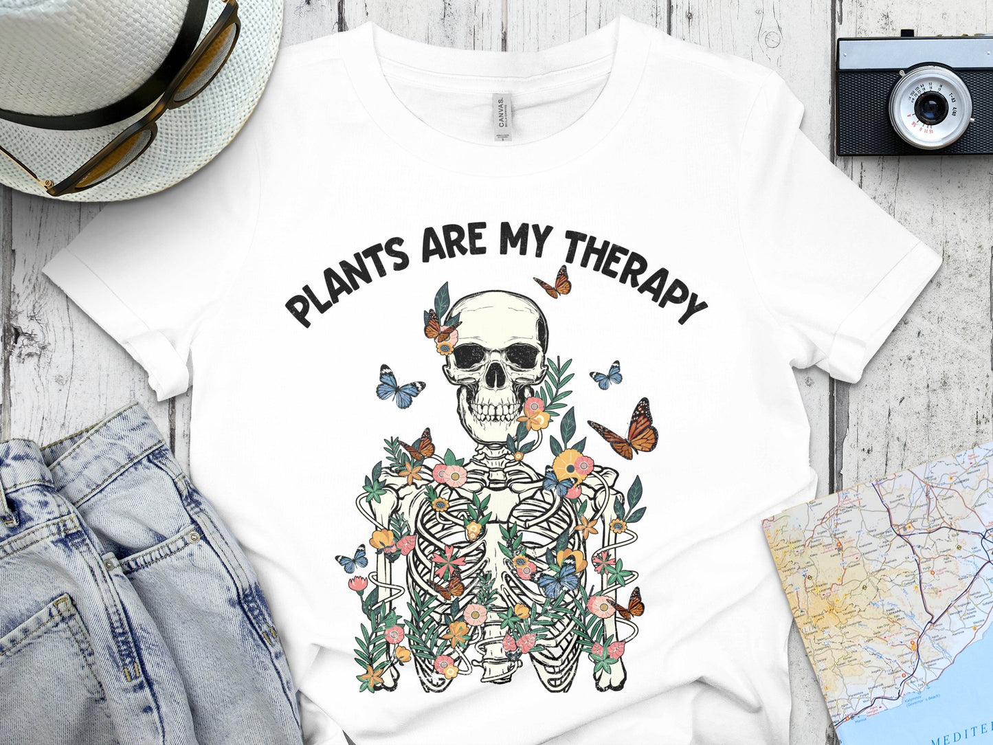 Graphic T-Shirt 'Plants are My Therapy' Skull with Flowers and Butterflies Tee