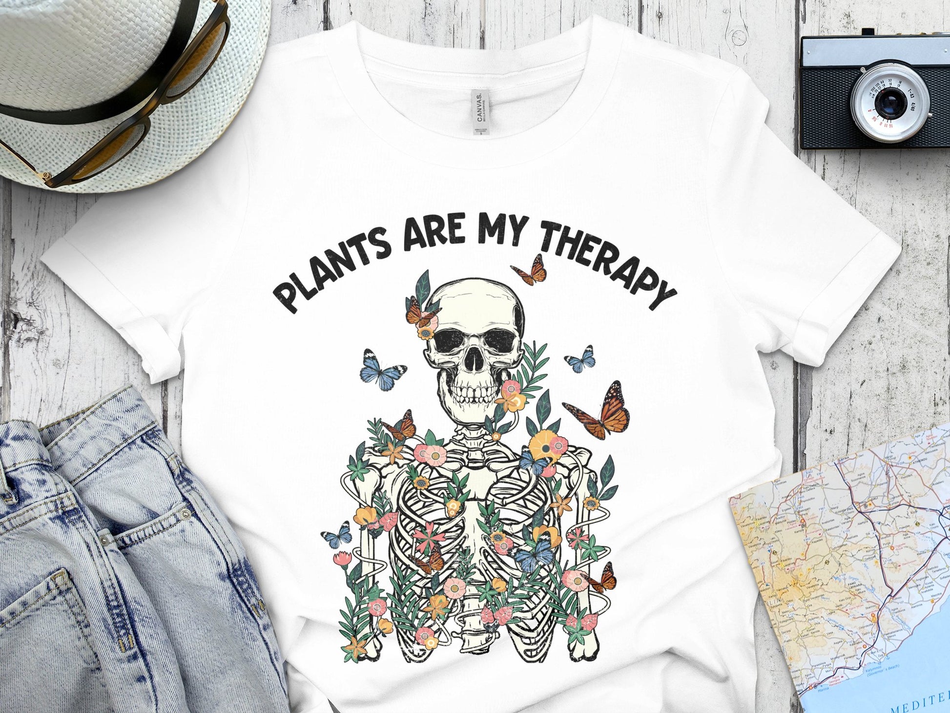 Graphic T-Shirt 'Plants are My Therapy' Skull with Flowers and Butterflies Tee