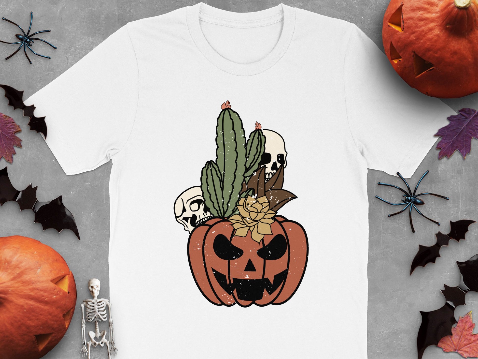 Halloween Themed T-Shirt with Pumpkin, Skulls, and Cactus Design, Spooky Casual Wear