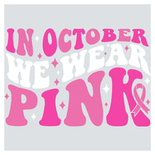 a pink ribbon with the words in october we wear pink