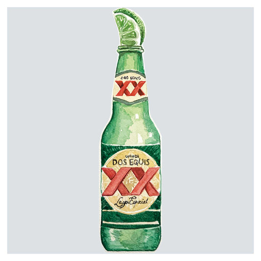 a bottle of beer with a green cap