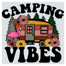 a pink flamingo is standing in front of a camper
