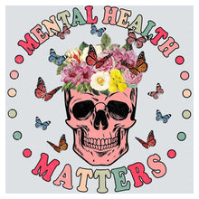 a skull with a flower crown on its head
