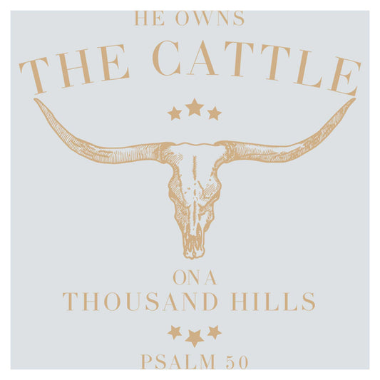 a cow skull with stars on it and the words he owns the cattle on a