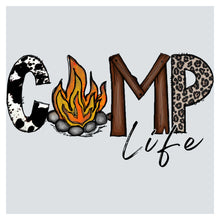 the word camp life with a fire and rocks