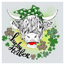 a cow wearing a green hat with shamrocks around it