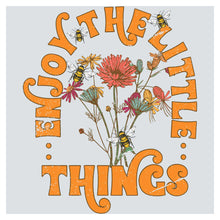 a t - shirt with a bunch of flowers on it