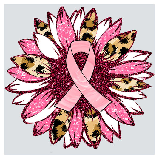 a pink ribbon on top of a flower
