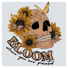 a drawing of a skull with sunflowers on it