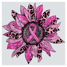 a sunflower with a pink ribbon on it