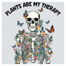 a skeleton with flowers and butterflies around it